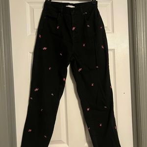 Black high rise mom jeans with rose details!